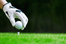 Close Up Golfer Hand & Ball Wallpaper