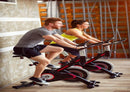 Man Woman Cycling Gym Wallpaper