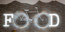 A white bicycle on a brick wall wallpaper