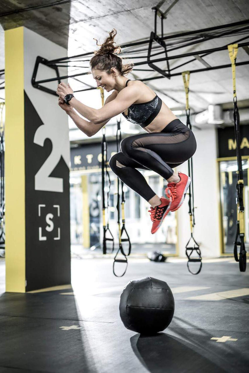 Woman Jumping Gym Wallpaper