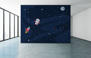 Astronaut With A Rocket In Space Wallpaper