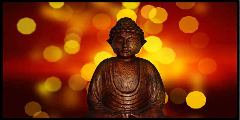 Lord Buddha Orange Light Wallpaper